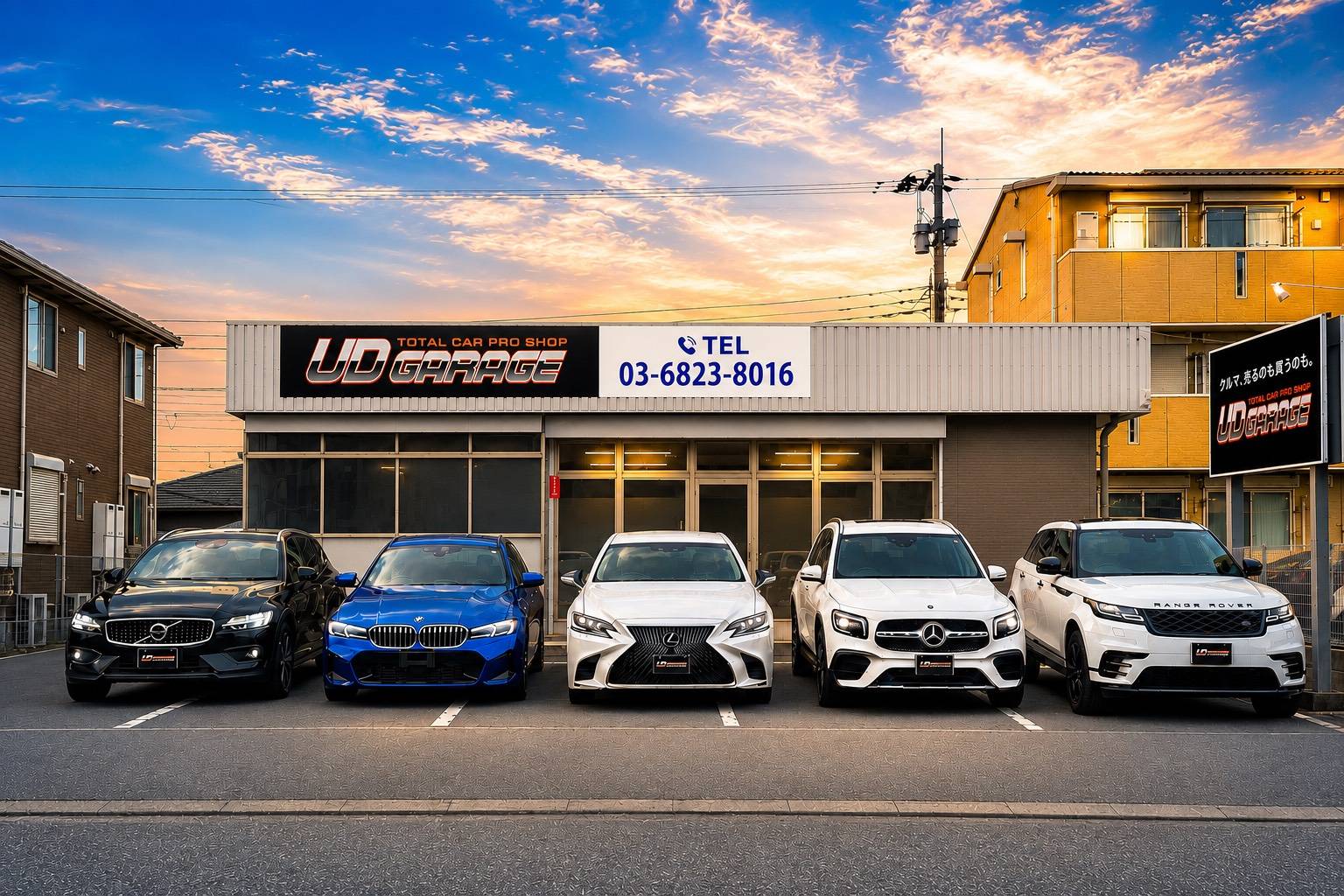 UD GARAGE 木更津店 夕景の店舗外観と在庫車両